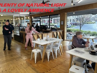 This corner cafe is big, bright and located with very high exposure.